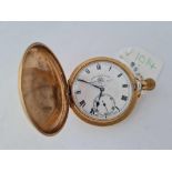 A rolled gold gents hunter pocket watch by Thos Russell and Son with seconds dial W/O