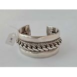 Antique North African very heavy silver bangle with centre twist decoration and relevant hallmarks