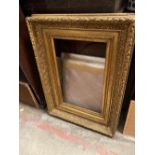 A Victorian heavy gilt picture frame