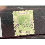 HONG KONG SG161 (1938). Scarce $10 green and violet. Good used. Cat £140