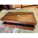 A 19th Century mahogany writing box with brass drop handles – 20” wide