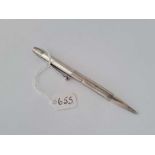 A silver propelling pencil