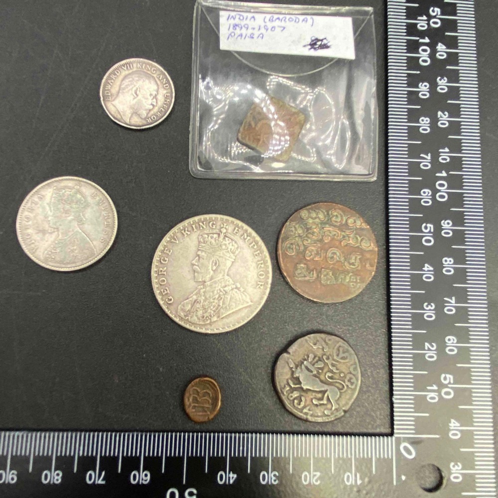 Seven early Indian coins