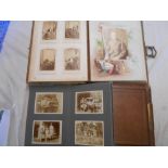 PHOTO ALBUMS a late Victorian tooled L. cabinet photo album with brass clasps with c. 75 port.