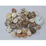 A bag of assorted watch movements