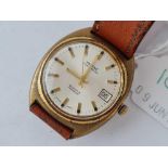 A gents Montine wrist watch with seconds sweep and date aperture on leather strap W/O