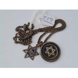 A silver star of David pendant and fob on silver necklace