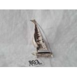 A miniature single masted sailing boat, 3" high stamped 925