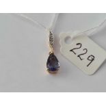 A tanzanite and diamond pendant 10ct gold – 1.3 gms