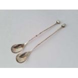 A pair of unusual hammered cruet spoons and twisted stems with pearl finials – Sheffield probably