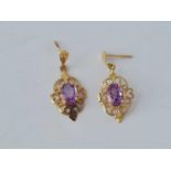 An attractive pair of 9ct amethyst earrings 1.4g inc