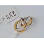 A pair of 9ct two colour earrings, 1.3g