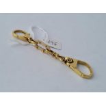 A UNUSUAL KEY RING 18CT GOLD – 19.6 GMS