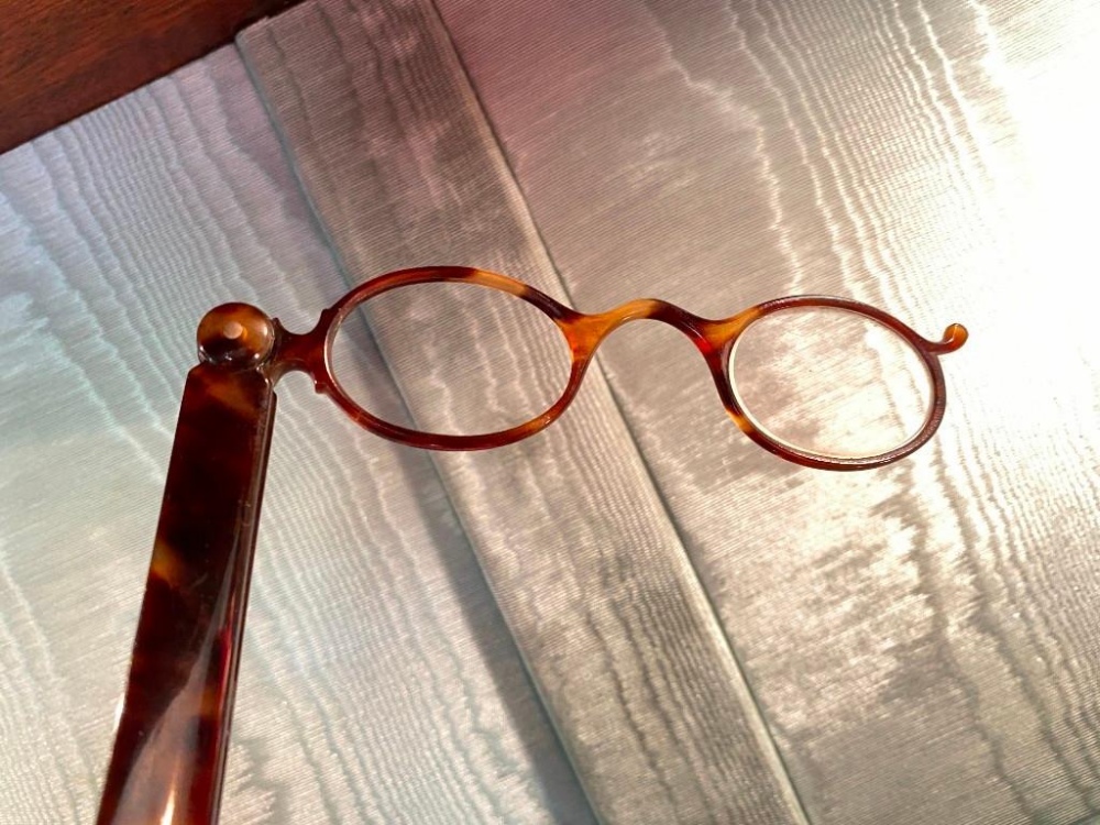 Pair of long handled spectacles, one lense missing - Image 2 of 2