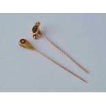 A Victorian 15ct gold sapphire knot stick pin -1.6 gms and 10ct diamond stick pin – 1.1 gms