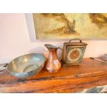 Eastern copper jug and a mantle clock