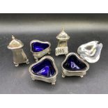 Five piece cruet set with glass liners. Birmingham 140gms excluding BGLs