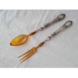 A pair of French silver handled salad servers
