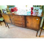 A shaped front mahogany sideboard with drawers and cupboards, 58" wide