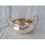 Two handled bowl with low sides. 5.5” over handle. Birmingham 1920 by G M . 145gms