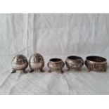 Pair of Indian silver embossed peppers, three various salts. 169Gms