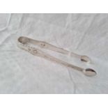 A pair of George III Exeter bright cut sugar tongs by GH