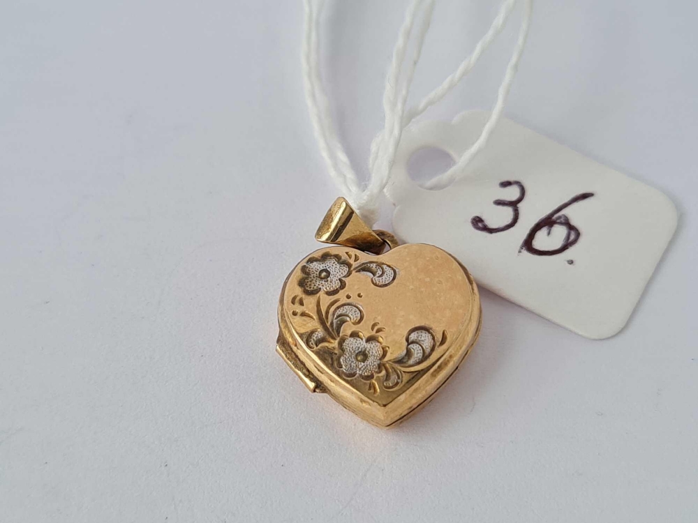 A heart locket 9ct – 1.3 gms