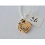 A heart locket 9ct – 1.3 gms