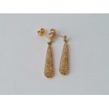 A pair of 9ct drop earrings 1.3g inc