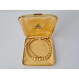 A single row Ciro graduated pearl necklace with 9ct clasp in original box