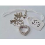 A white gold diamond set heart pendant necklace 18 inches