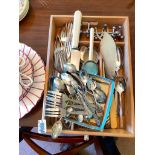Wooden tray of cutlery including knife rests and silver handled toasting fork