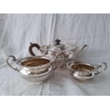 A good heavy Georgian style tea set, half fluted with gadroon borders, London 1900 by M & S, 1115g