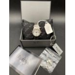 A ladies stainless steel wrist watch by BULOVA with seconds sweep and date aperture (as new) in