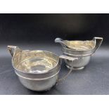 George III Cream jug and matching sugar basin engraved with crest. London 1905. 290gms
