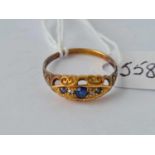 A sapphire and diamond five stone ring set in gold size P