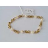 A PEARL SET BRACELET 18CT GOLD – 11 GMS