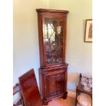 Another reproduction mahogany corner cupboard with glazed door