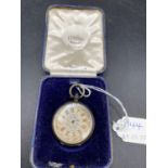 A boxed ladies silver fob watch with silvered dial