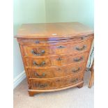 A small mahogany bow fronted chest of four drawers and brushing slide, bracket feet, 28" wide