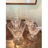 A set of four large wine glasses and another pair engraved