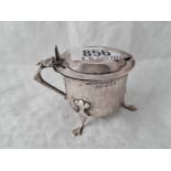 Arts and crafts style mustard pot on three legs. Birmingham 1908. 40gms exc BGL