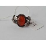 A arts and crafts silver and carnelian ring size O