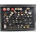 A tray of approx seventy assorted metal stone set dress rings including tray