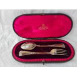 A good quality mint christening spoon and fork in a fitted case – London 1897 by Goldsmiths