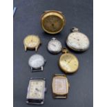 A bag of assorted vintage watches