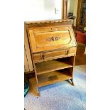 Light Oak bureau with shelves under. 26" wide