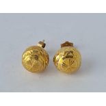 A pair of high carat gold ball shaped earrings – 4.6 gms