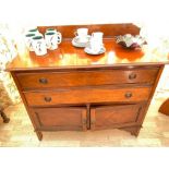 Figured mahogany chest with drawers and cupboard. 39" wide