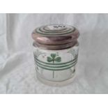 Unusual dressing table jar inset with green enamel and Shamrocks.2.5” diameter. Birmingham 1911.